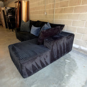 Black corduroy sectional - opposite rear and side view