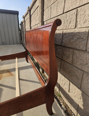 Ethan Allen king sleigh bed - cherry wood finish detail
