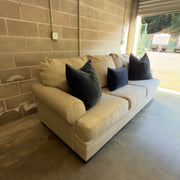 Ashley Antonlini beige sofa - left three-quarter view