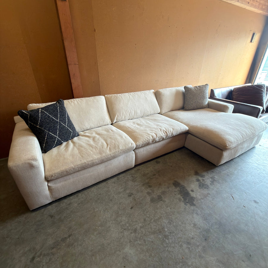 Ashley Furniture Elyza cream three-piece sectional with chaise - full front view