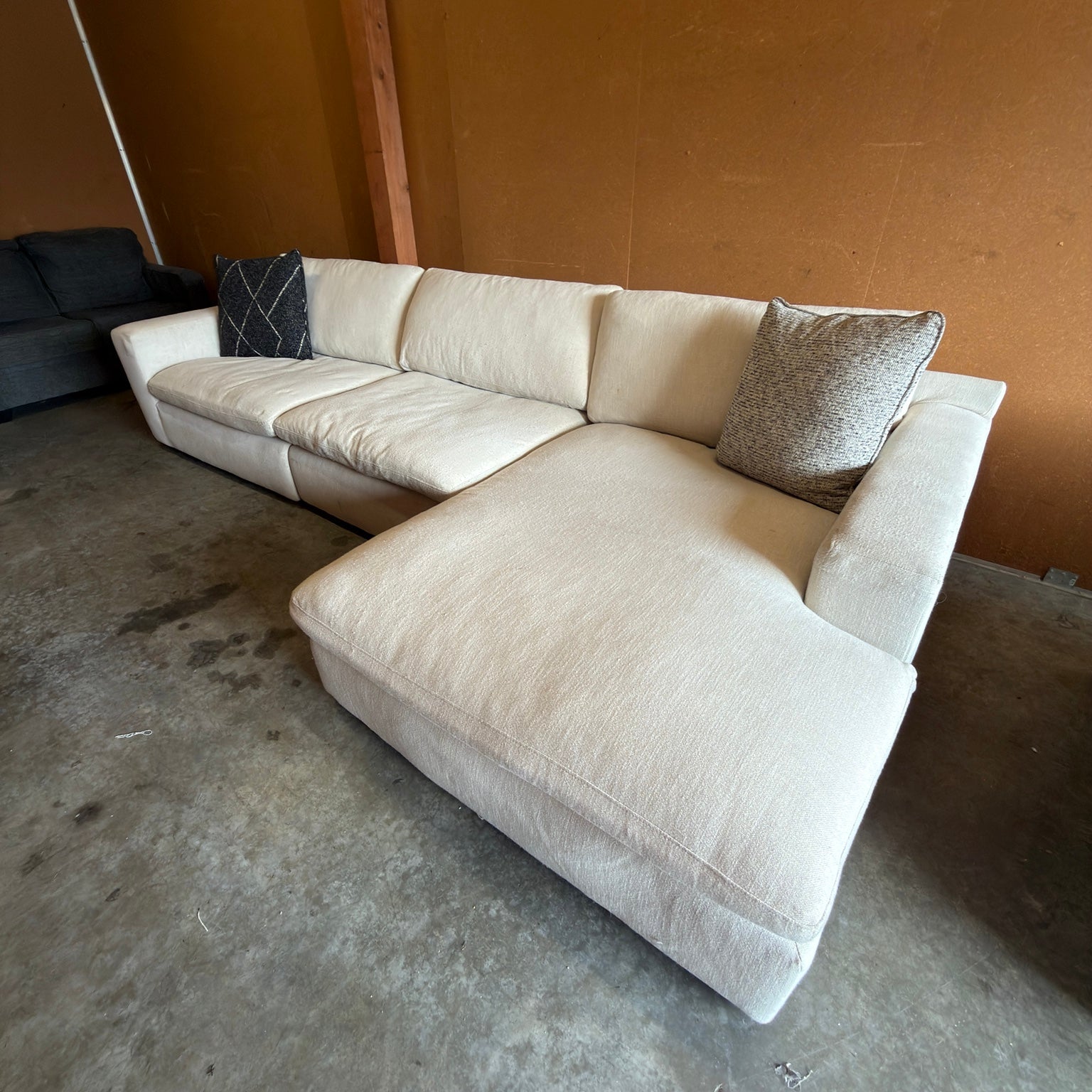 Ashley Furniture Elyza cream sectional - right chaise three-quarter view