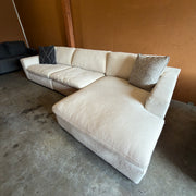 Ashley Furniture Elyza cream sectional - right chaise three-quarter view