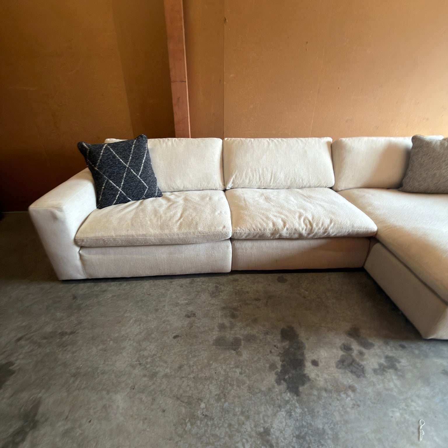 Ashley Furniture Elyza cream sectional - straight front seating view