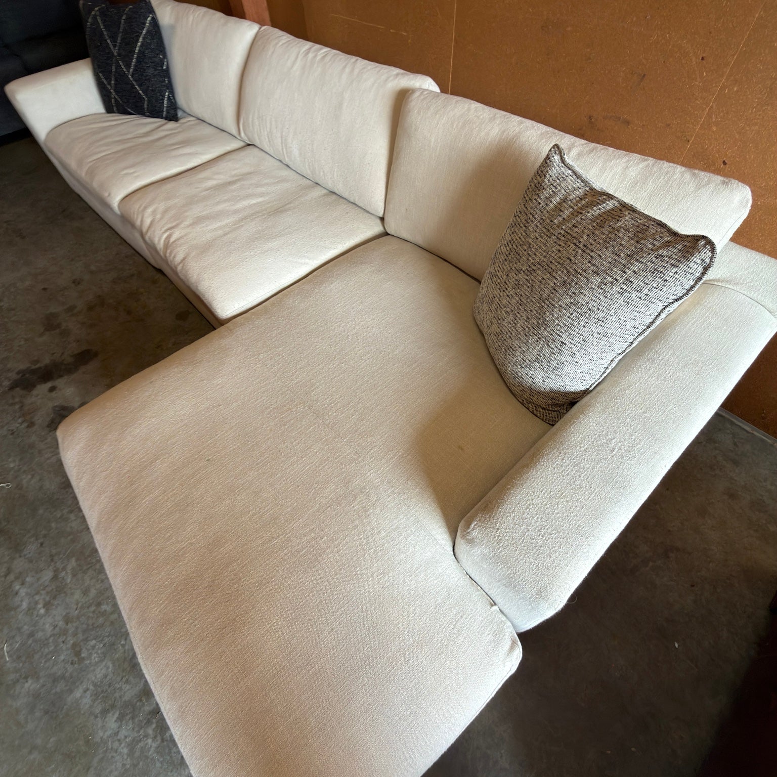 Ashley Furniture Elyza cream sectional - close seating and chaise view