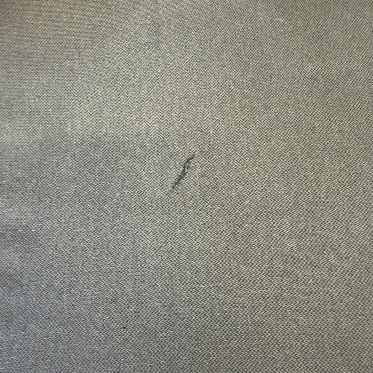 Room & Board Metro chaise cushion - close-up of small repaired rip
