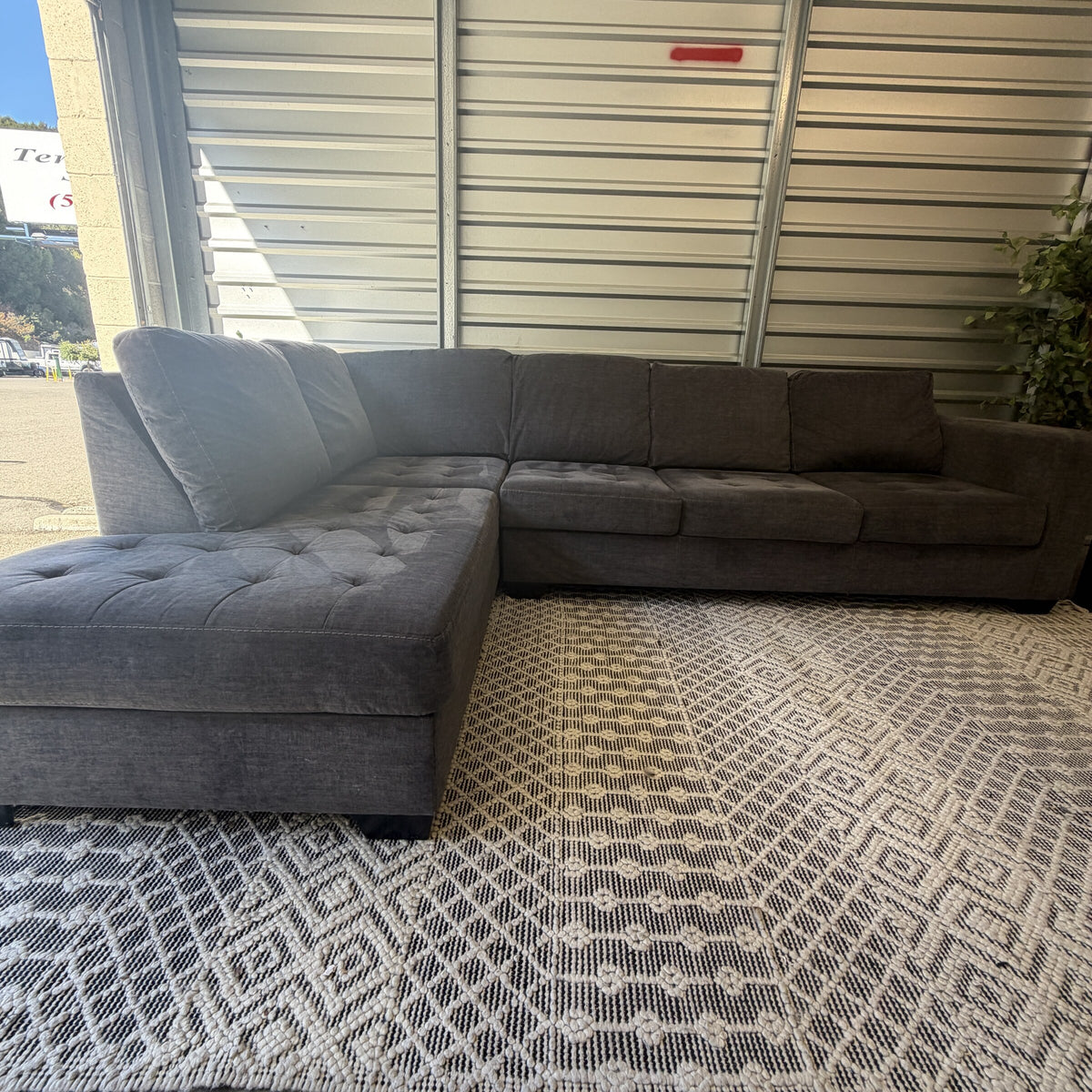Ashley Maier charcoal gray left-chaise sectional sofa, full front view