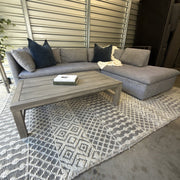 West Elm Shelter sectional staged with blue pillows and cream throw