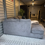 Ashley gray U-shaped sectional and storage ottoman — actual item IMG_8465.JPG