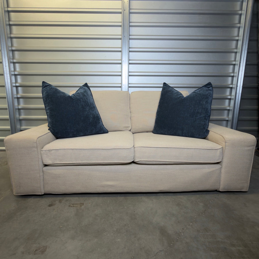Used beige IKEA Kivik sofa with removable covers, for sale at Couch Potato Furniture in Hayward, California