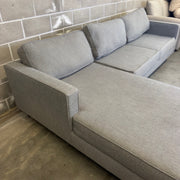 Gray Living Spaces Calais III sectional sofa, rear corner view