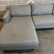 Gray Living Spaces Calais III sectional sofa with left-facing chaise, front view