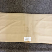 Crate & Barrel brand tag on sofa base fabric