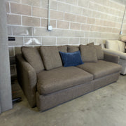 Brown Crate & Barrel tweed sofa, angled view