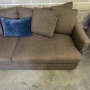 Brown Crate & Barrel tweed sofa, side view