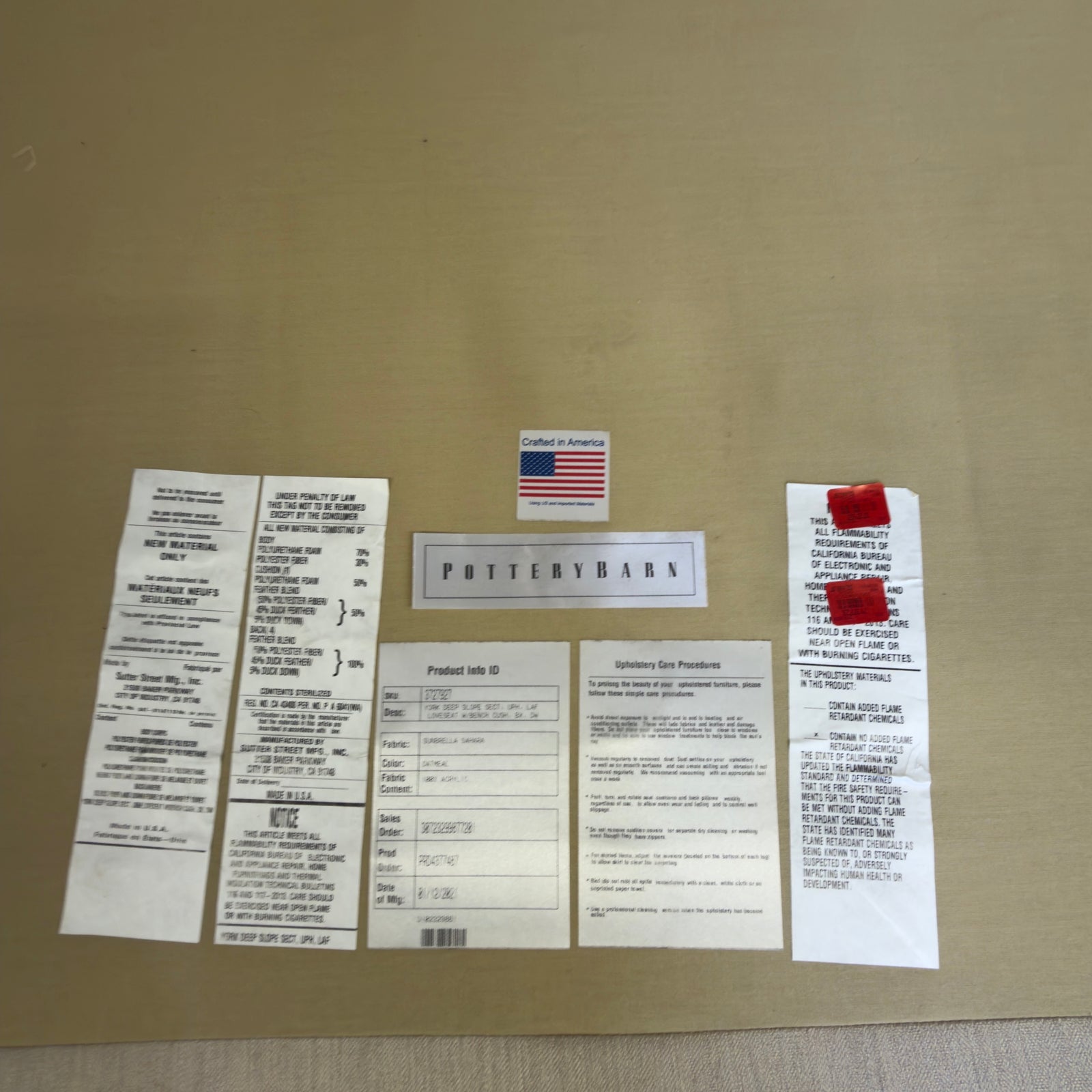 Pottery Barn York product info tag showing Umbrella Sahara fabric in Oatmeal