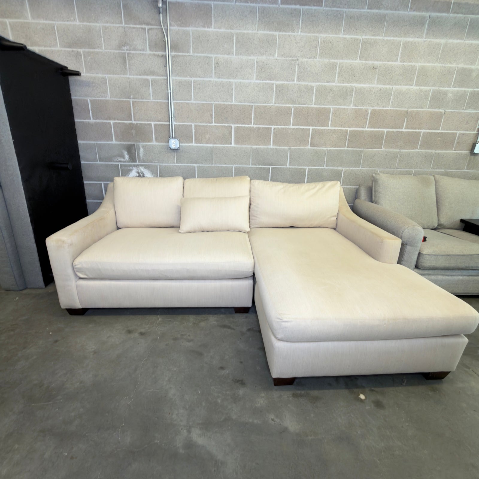 Oatmeal Pottery Barn York chaise loveseat, front three-quarter view