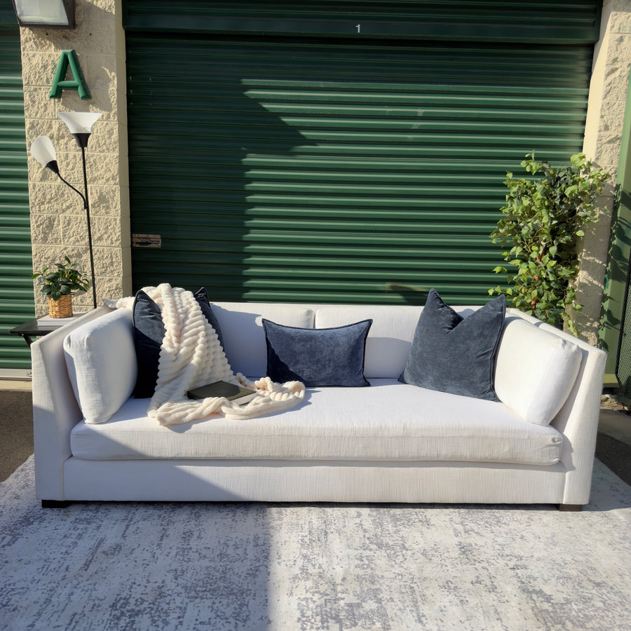 Cream Restoration Hardware sofa - lifestyle styled view