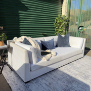 Cream Restoration Hardware sofa - side table styled view