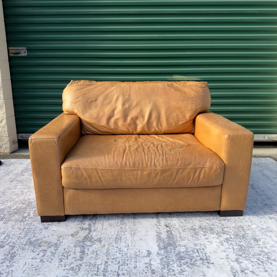 Cognac leather oversized club chair, front view