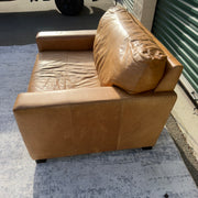 Cognac leather oversized club chair, top-down angled view